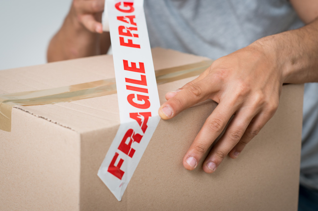 tagging a package as fragile before shipping it