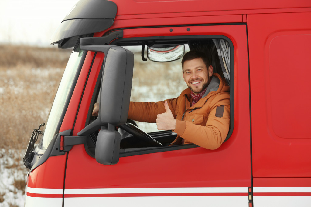 man in the truck smiling