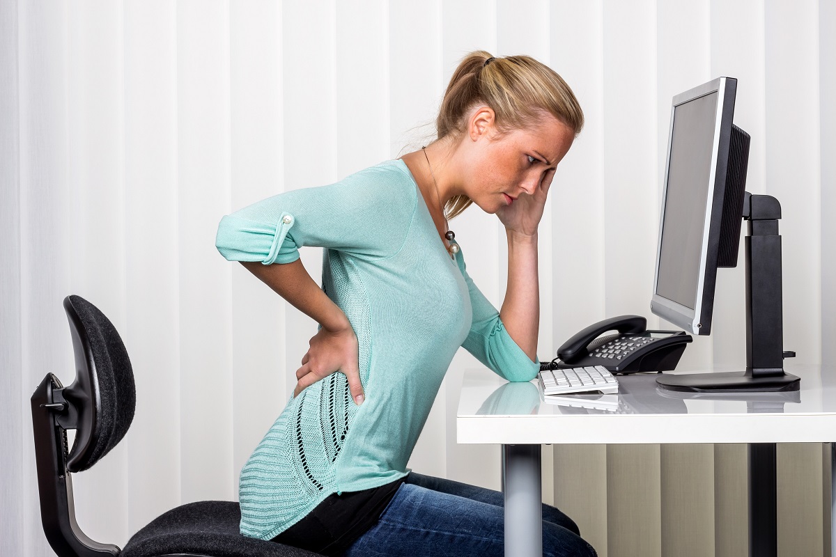 woman suffering from spinal injury